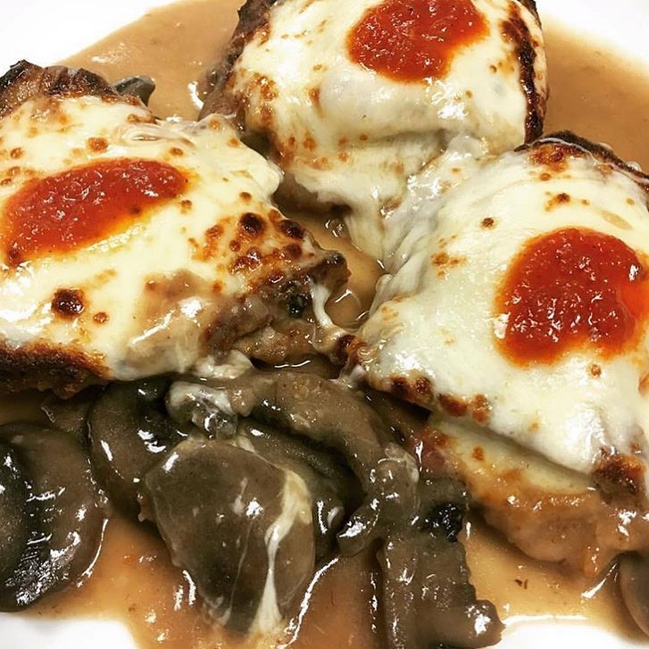 Veal Sorrentino with mozzarella and mushroom demi-glace
